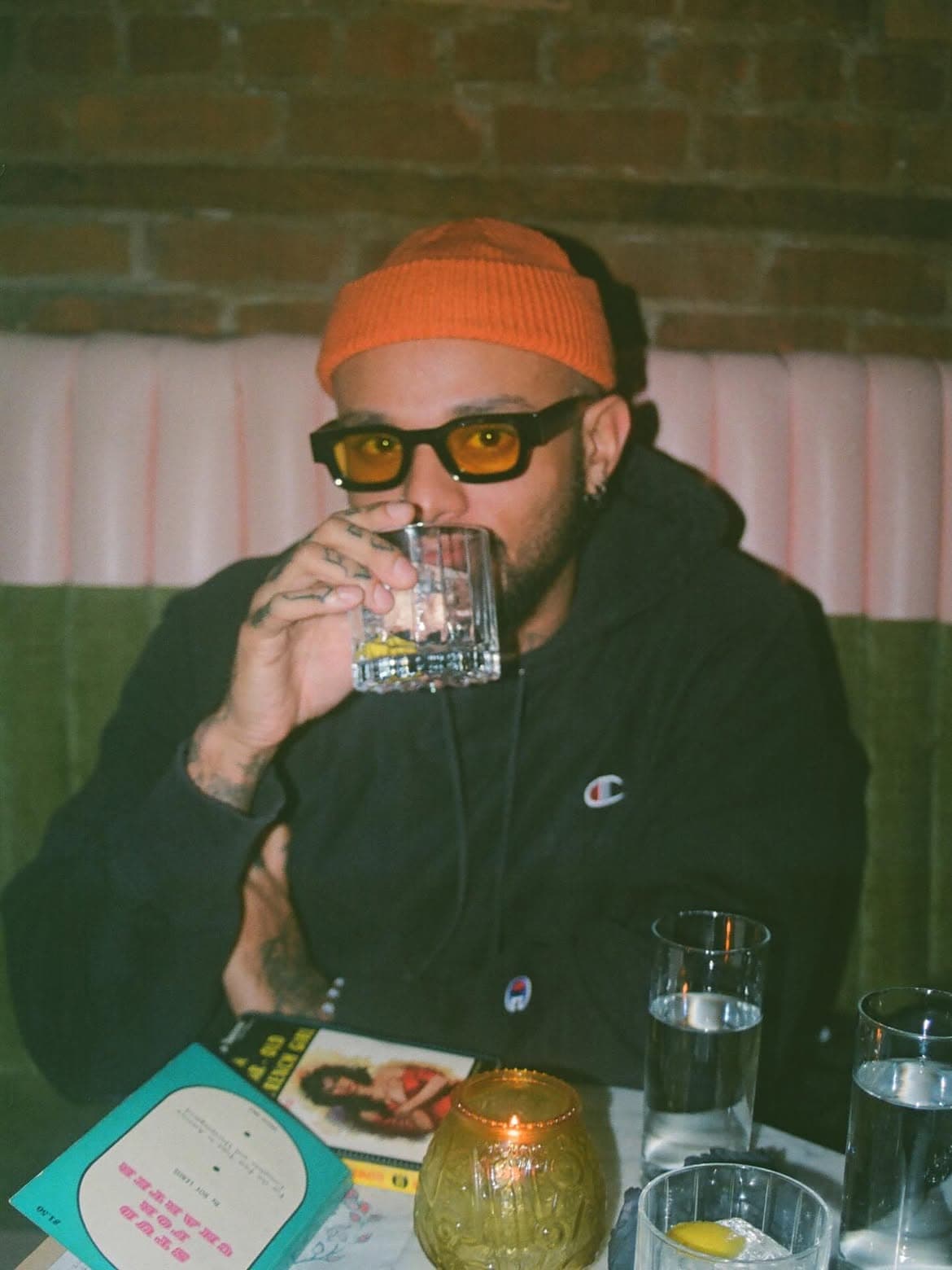 OØAK frames with yellow lenses worn at dinner
